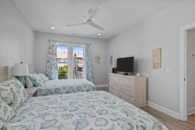 1905 Emerald Dr, Emerald Isle, NC 28594 - bedroom with baseboards, wood finished floors, recessed lighting, a ceiling fan, and access to outside