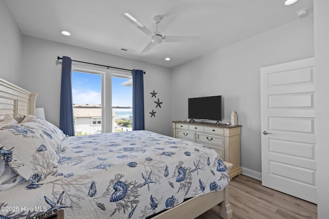 1905 Emerald Dr, Emerald Isle, NC 28594 - bedroom with light wood-type flooring, recessed lighting, baseboards, and a ceiling fan