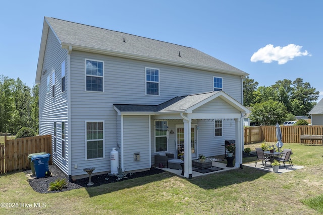 205 River Oats Ct, Holly Ridge, NC 28445 - back of property with a patio area, outdoor lounge area, and roof with shingles