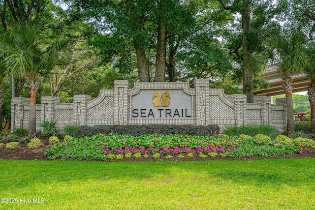 550 Sunset Lakes Blvd SW, Sunset Beach, NC 28468 - community / neighborhood sign with a lawn