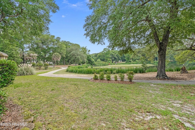 550 Sunset Lakes Blvd SW, Sunset Beach, NC 28468 - view of grassy yard