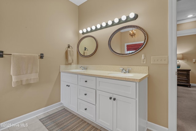 550 Sunset Lakes Blvd SW, Sunset Beach, NC 28468 - full bathroom featuring baseboards, double vanity, and tile patterned floors