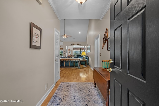 550 Sunset Lakes Blvd SW, Sunset Beach, NC 28468 - entrance foyer with light wood-type flooring, baseboards, and ceiling fan