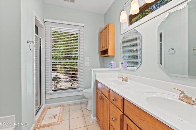 288 Atlantic Ct SW, Supply, NC 28462 - bathroom with toilet, tile patterned floors, double vanity, a shower with door, and baseboards