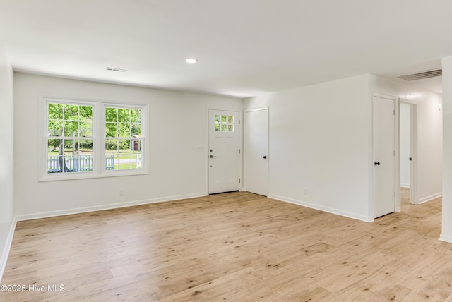 150 Willetts Dr, Southport, NC 28461 - entrance foyer with light wood-type flooring, baseboards, and recessed lighting