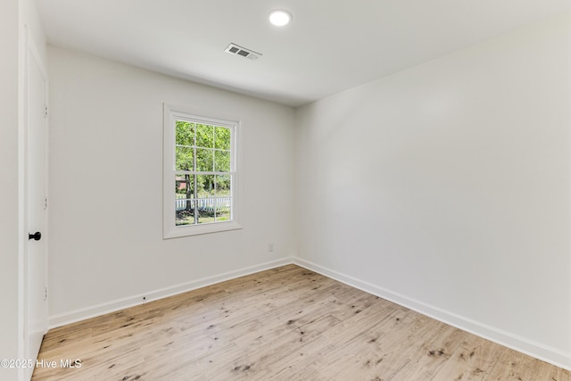 150 Willetts Dr, Southport, NC 28461 - unfurnished room with wood finished floors, baseboards, and recessed lighting