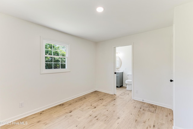150 Willetts Dr, Southport, NC 28461 - empty room with light wood-type flooring, baseboards, and recessed lighting