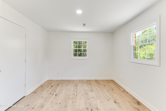 150 Willetts Dr, Southport, NC 28461 - empty room with light wood-style floors, baseboards, and recessed lighting