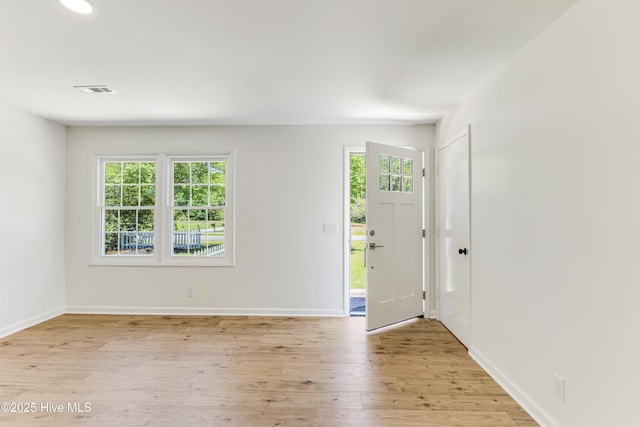 150 Willetts Dr, Southport, NC 28461 - entrance foyer with light wood finished floors and baseboards