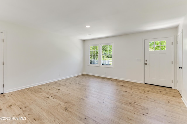 150 Willetts Dr, Southport, NC 28461 - foyer entrance featuring light wood-style flooring, baseboards, and recessed lighting