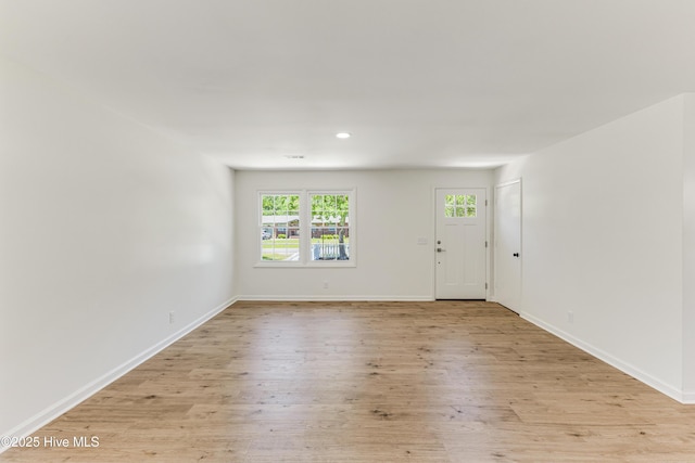 150 Willetts Dr, Southport, NC 28461 - empty room featuring light wood-style floors, recessed lighting, and baseboards