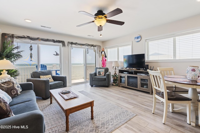 1437 Fort Fisher Blvd S Unit D3, Kure Beach, NC 28449 - living room featuring ceiling fan and light wood-style flooring