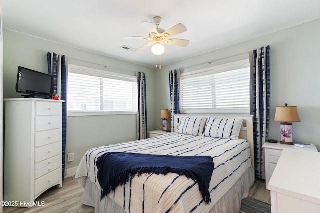 1437 Fort Fisher Blvd S Unit D3, Kure Beach, NC 28449 - bedroom featuring light wood-style flooring and a ceiling fan