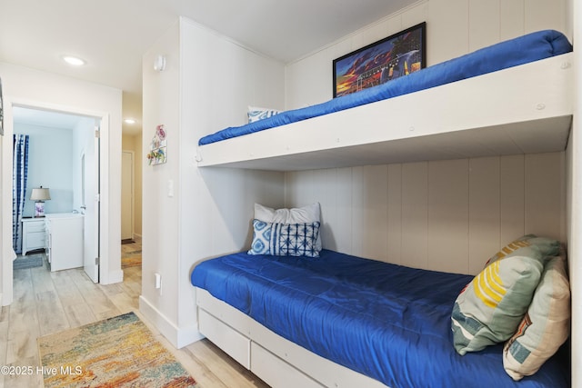 1437 Fort Fisher Blvd S Unit D3, Kure Beach, NC 28449 - bedroom featuring wood finished floors and baseboards