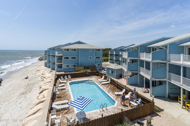 1437 Fort Fisher Blvd S Unit D3, Kure Beach, NC 28449 - community pool featuring view of water and beach and a patio area