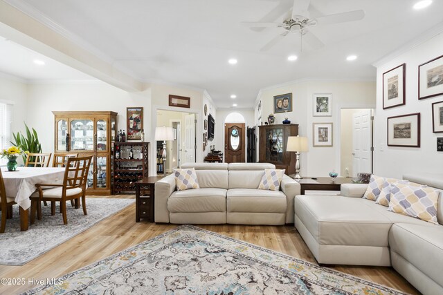 106 N Shore Dr, Sneads Ferry, NC 28460 - living area featuring a ceiling fan, healthy amount of natural light, recessed lighting, wood finished floors, and ornamental molding