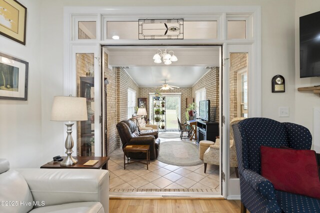 106 N Shore Dr, Sneads Ferry, NC 28460 - dining space with ornamental molding, recessed lighting, a multi sided fireplace, light wood-type flooring, and baseboards