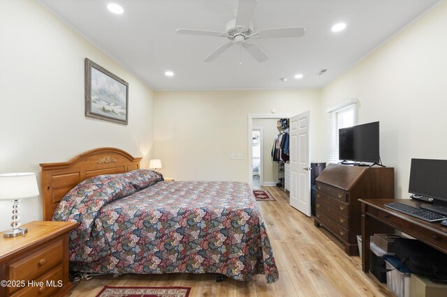 106 N Shore Dr, Sneads Ferry, NC 28460 - bedroom featuring light wood-type flooring, recessed lighting, a spacious closet, and ceiling fan