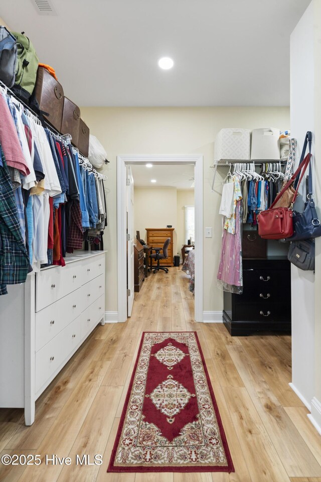106 N Shore Dr, Sneads Ferry, NC 28460 - spacious closet with light wood-type flooring