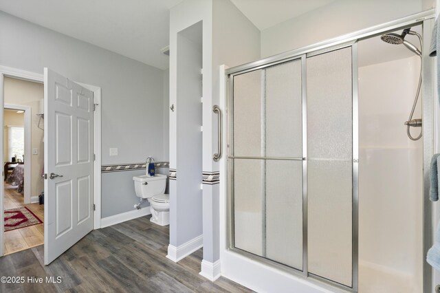 106 N Shore Dr, Sneads Ferry, NC 28460 - full bath with a shower stall, toilet, wood finished floors, and baseboards