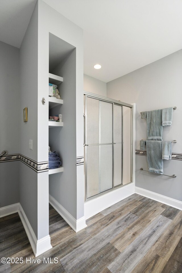 106 N Shore Dr, Sneads Ferry, NC 28460 - full bathroom featuring wood finished floors, a shower stall, baseboards, and recessed lighting