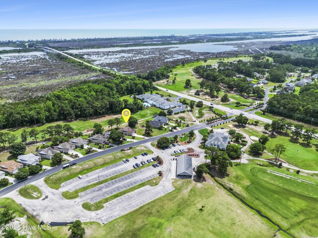 106 N Shore Dr, Sneads Ferry, NC 28460 - aerial view of property and surrounding area featuring a large body of water, nearby suburban area, and a golf course
