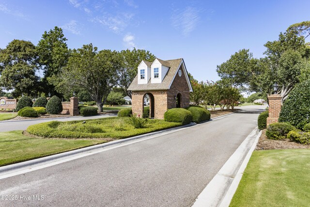 106 N Shore Dr, Sneads Ferry, NC 28460 - view of asphalt street featuring curbs