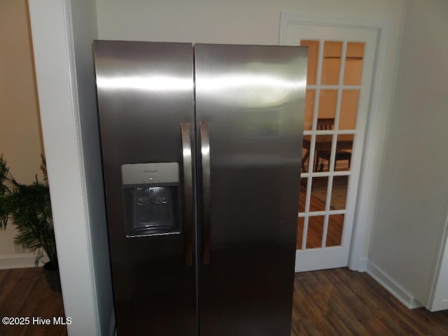 108 Swan Point Rd, Bayboro, NC 28515 - kitchen view of stainless steel fridge with ice dispenser, wood finished floors, and baseboards