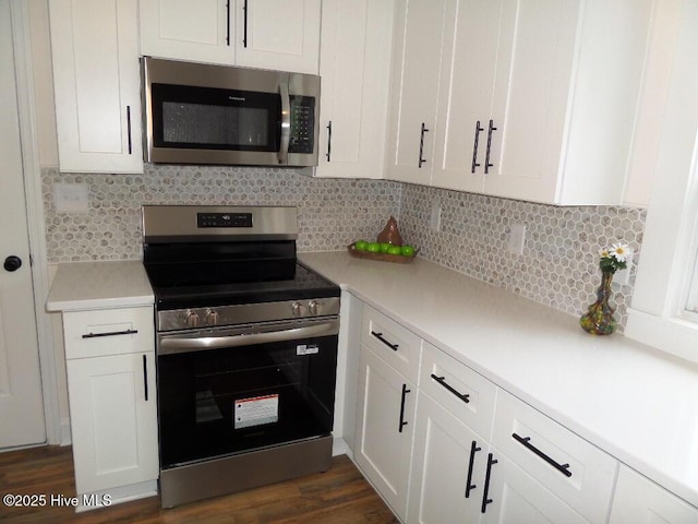 108 Swan Point Rd, Bayboro, NC 28515 - kitchen featuring stainless steel appliances, white cabinetry, and light countertops