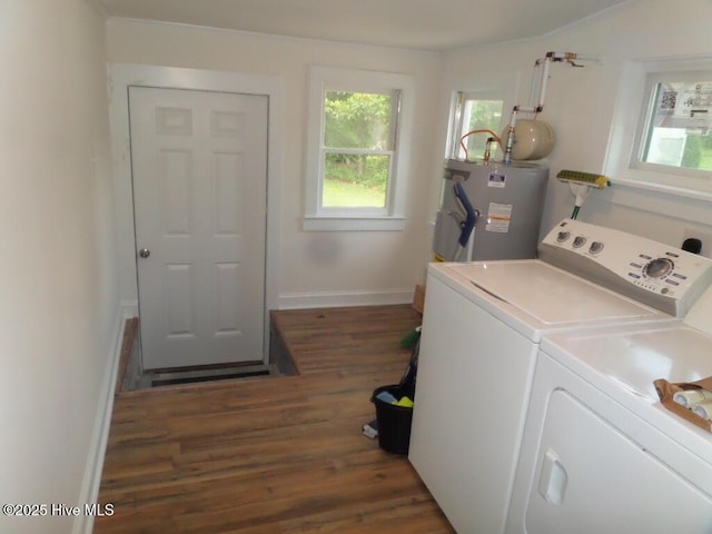 108 Swan Point Rd, Bayboro, NC 28515 - laundry room with water heater, washing machine and clothes dryer, wood finished floors, and baseboards