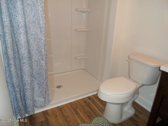 108 Swan Point Rd, Bayboro, NC 28515 - full bathroom with wood finished floors, curtained shower, baseboards, toilet, and vanity