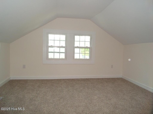 108 Swan Point Rd, Bayboro, NC 28515 - additional living space featuring carpet flooring, vaulted ceiling, and baseboards