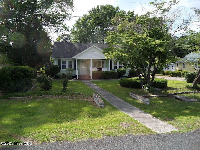 108 Swan Point Rd, Bayboro, NC 28515 - bungalow with a porch and a front yard