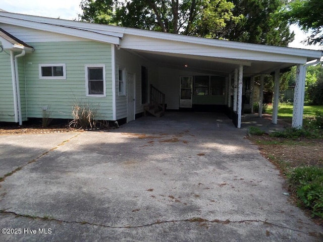 108 Swan Point Rd, Bayboro, NC 28515 - view of property exterior featuring driveway and an attached carport