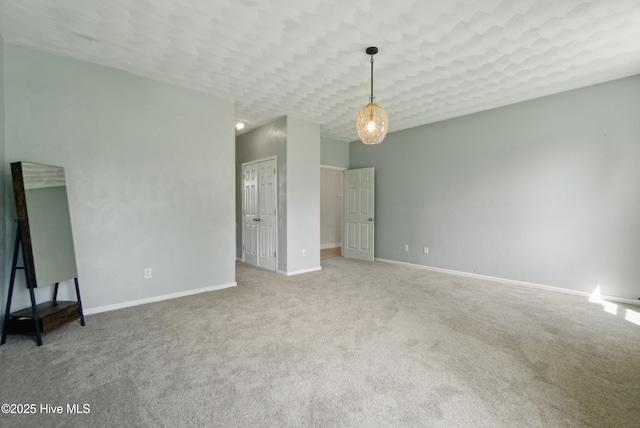 118 Stedman Ln E, Elizabeth City, NC 27909 - unfurnished living room with carpet floors and baseboards