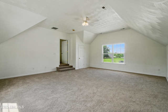 118 Stedman Ln E, Elizabeth City, NC 27909 - bonus room with vaulted ceiling, carpet floors, baseboards, and ceiling fan