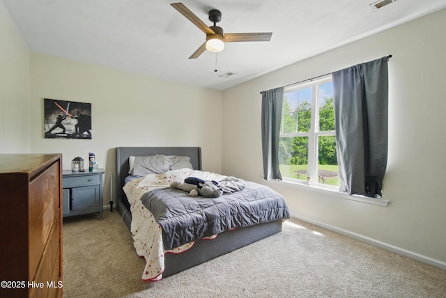 118 Stedman Ln E, Elizabeth City, NC 27909 - carpeted bedroom featuring baseboards and ceiling fan