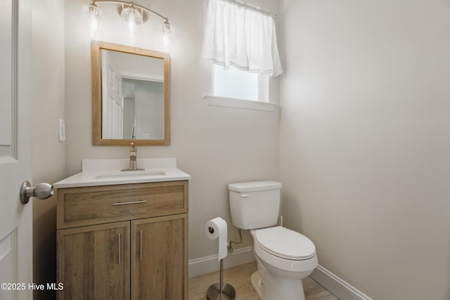 118 Stedman Ln E, Elizabeth City, NC 27909 - bathroom featuring toilet, vanity, and baseboards