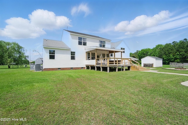 118 Stedman Ln E, Elizabeth City, NC 27909 - rear view of house with crawl space, an outdoor structure, a lawn, a deck, and roof with shingles