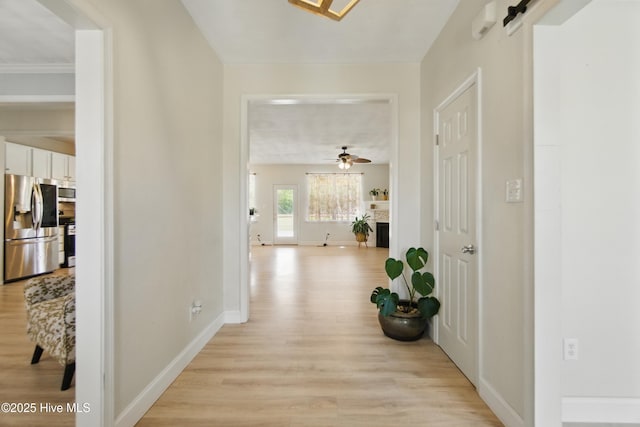 118 Stedman Ln E, Elizabeth City, NC 27909 - corridor featuring light wood-type flooring and baseboards