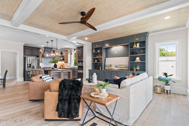412 Keziah St, Oak Island, NC 28465 - living area with a ceiling fan, ornamental molding, light wood finished floors, baseboards, and wood ceiling with exposed beams