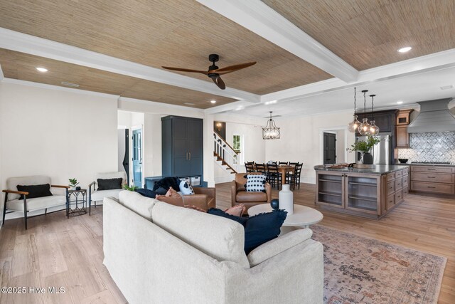 412 Keziah St, Oak Island, NC 28465 - living area with a ceiling fan, a chandelier, stairs, light wood-type flooring, and recessed lighting