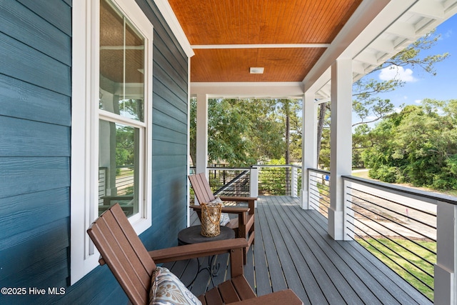 412 Keziah St, Oak Island, NC 28465 - view of wooden terrace