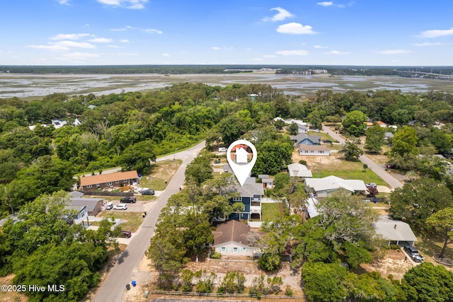412 Keziah St, Oak Island, NC 28465 - aerial overview of property's location featuring a large body of water and nearby suburban area