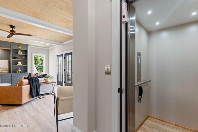 412 Keziah St, Oak Island, NC 28465 - hall featuring elevator, light wood-style floors, ornamental molding, baseboards, and recessed lighting