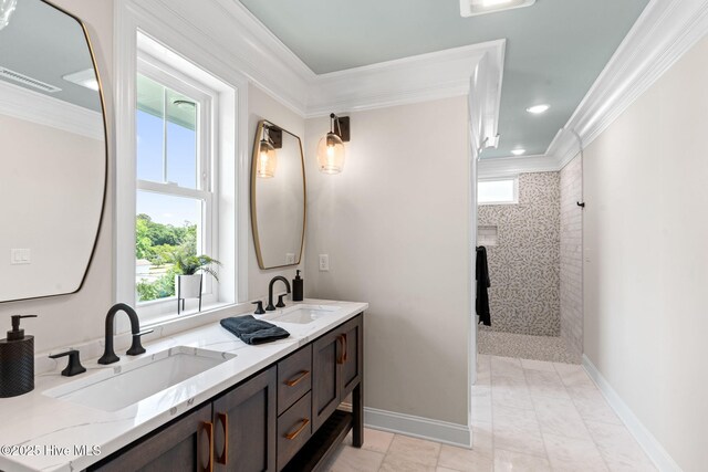 412 Keziah St, Oak Island, NC 28465 - full bathroom featuring crown molding, double vanity, a walk in shower, and baseboards