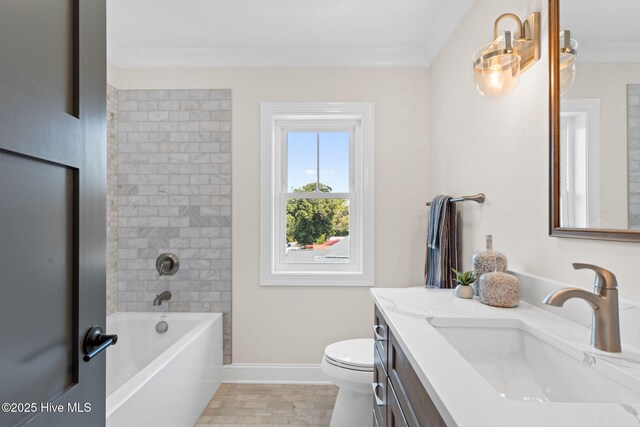 412 Keziah St, Oak Island, NC 28465 - bathroom featuring vanity, toilet, crown molding, baseboards, and  shower combination