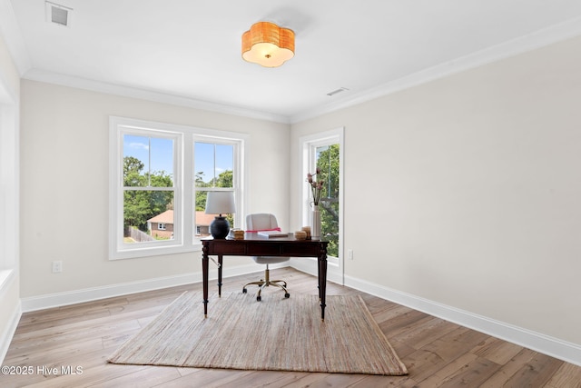 412 Keziah St, Oak Island, NC 28465 - office with crown molding, baseboards, and light wood-style flooring