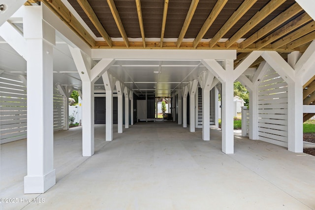 412 Keziah St, Oak Island, NC 28465 - view of patio featuring a carport