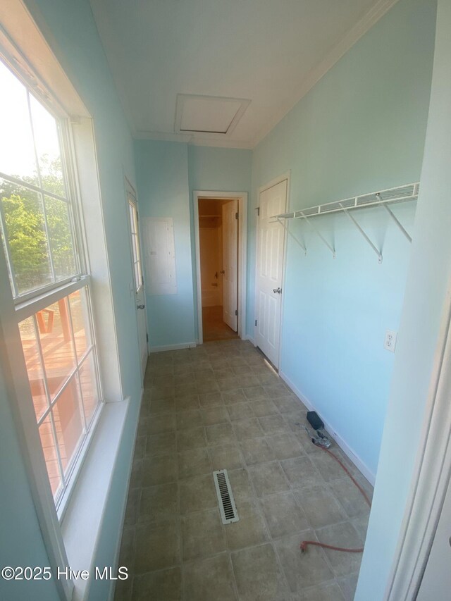 152 Meadowlark Ln, Newport, NC 28570 - laundry area with attic access, healthy amount of natural light, and baseboards
